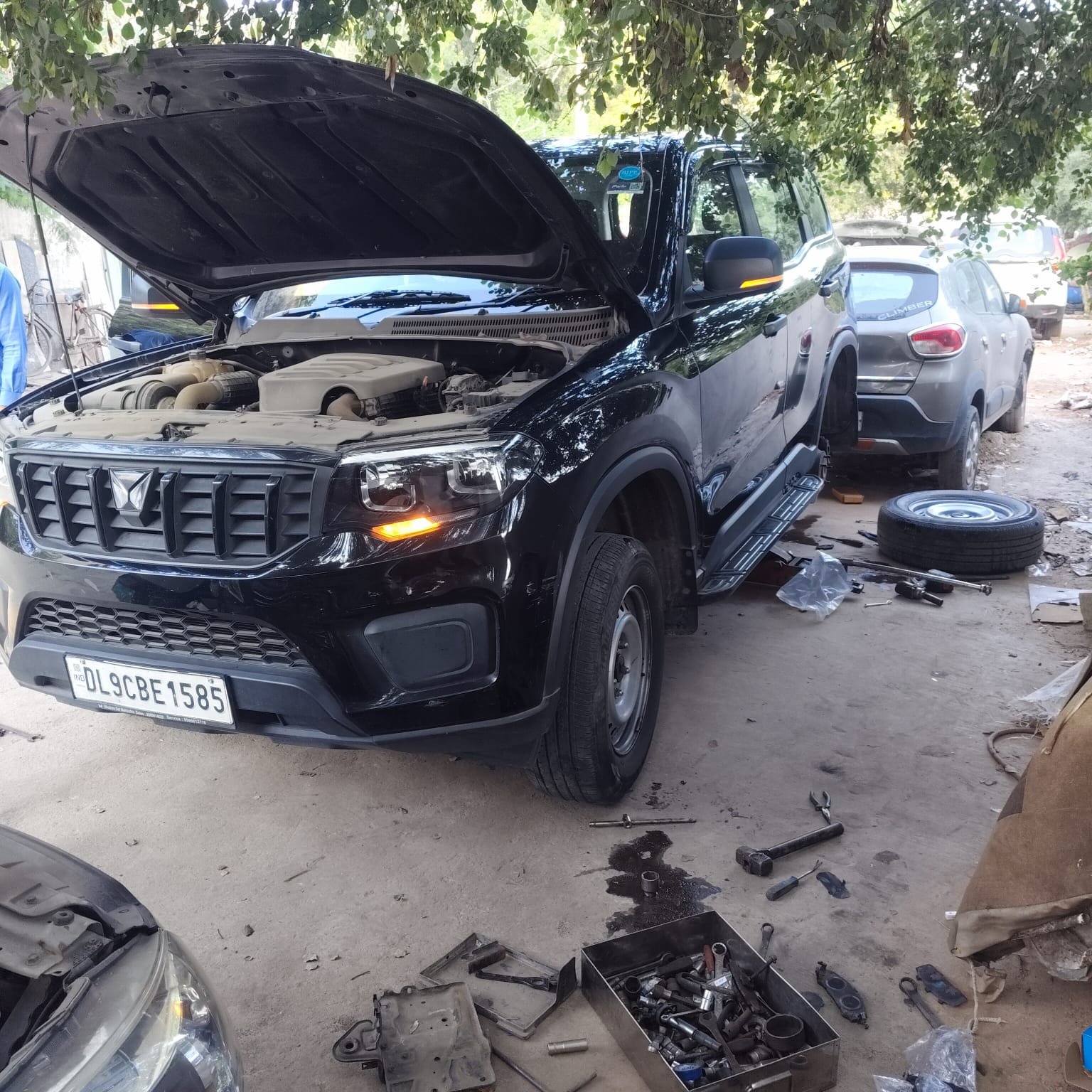 Amit Motors workshop with cars on lifts